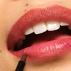Model applying lip stain marker