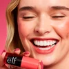 Model Holding Sheer For It Blush Tint

