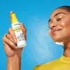 Model Applying Suntouchable All Set for Sun SPF 45

